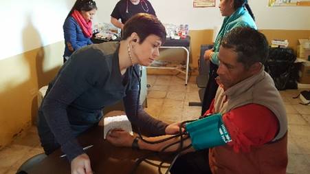 Patient receiving compassionate medical care through Abide in Christ. 