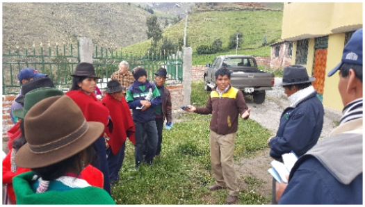 Ecuadorian evangelica lpastor sharing Christ at dental evangelism mission. 