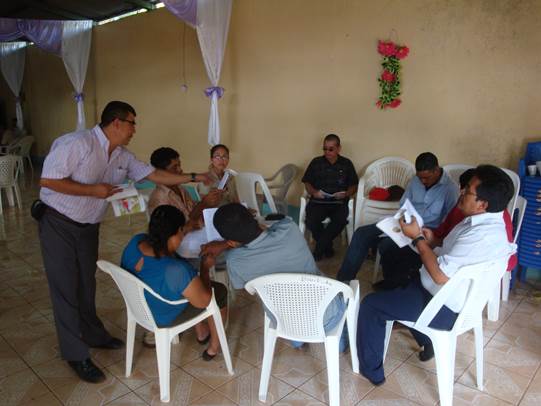 Small groups studying in Abide in Christ evangelism workshop.