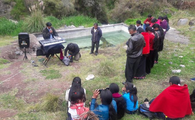 Baptism of new believers in Ecuador.