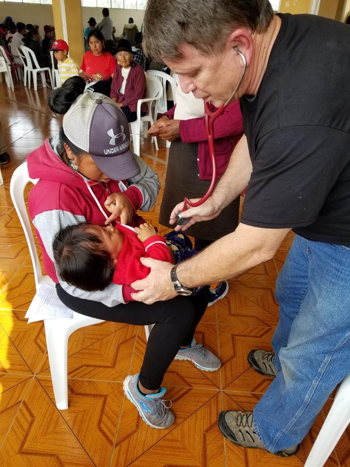 Patient receiving attention at Abide in Christ medical tam.