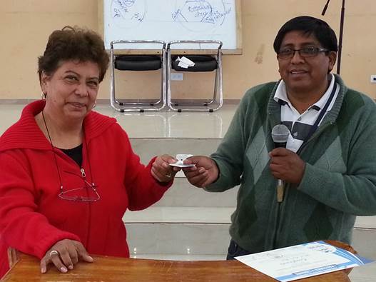 Carmen presenting Charles Stanley mp3 memory stick with sermons