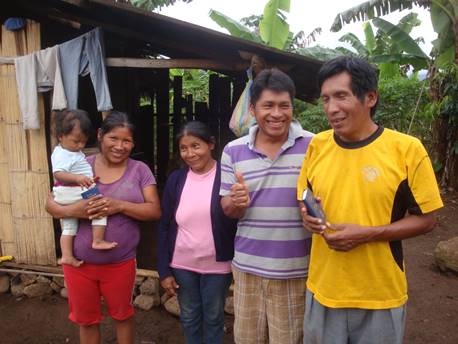 Shuar pastor and new believers in Chiwias, Ecuador