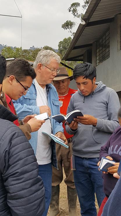 Abide in Christ Medical team menber sharing Christ through personal witness.