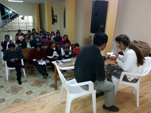Demonstration on personal witnessing in Ecuadorian evangelical church.