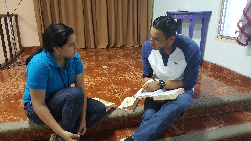 Participants in Evangelismo en Profundidad workshop practicing personal witnessing.