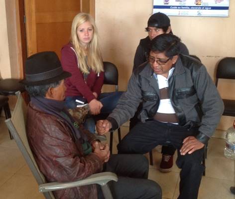 Quichua seminary professor leading man to Christ in Ecuador.