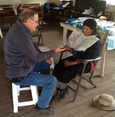 Abide in Christ mission directorpresenting the gospel on a dental mission team. 