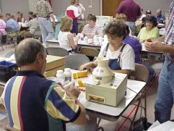 TEAM PREPARING MEDICINE FOR A MISSION TRIP