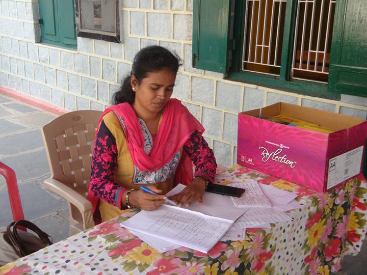 Indian evangelical administrative assistant at evangelism conference.