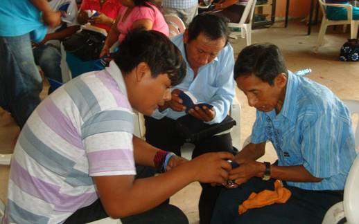 Students practicing personal evangelism in class