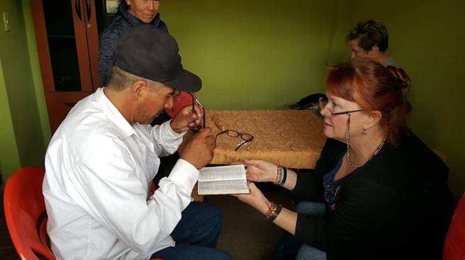 Reading glasses help new believers read God's Word.