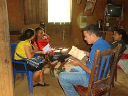 Evangelism in Depth students witnessing in home in San Juan de Rio Coca, Nicaragua