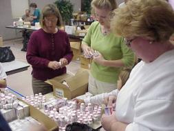 A TEAM PREPARING MEDICINES FOR A MISSION TRIP