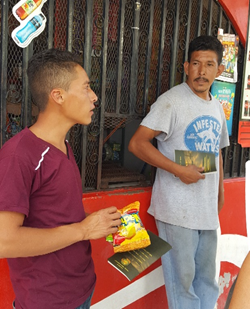 Wil witnessing to two men in Tegucigalpa who accepted Christ as savior. 