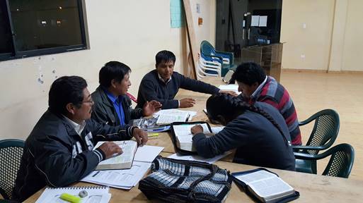 Small groupos working in Abide in Christ course at Peniel Seminary extension near Quito, Ecuador.